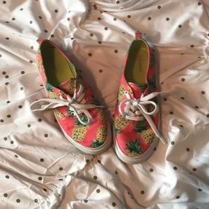 Slide on low top sneakers.